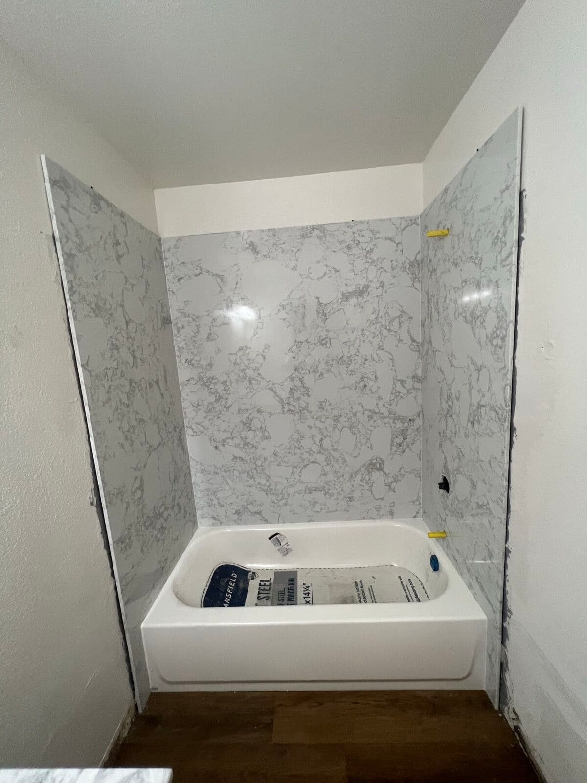 After — Tub surround: waterproofing to wall panels