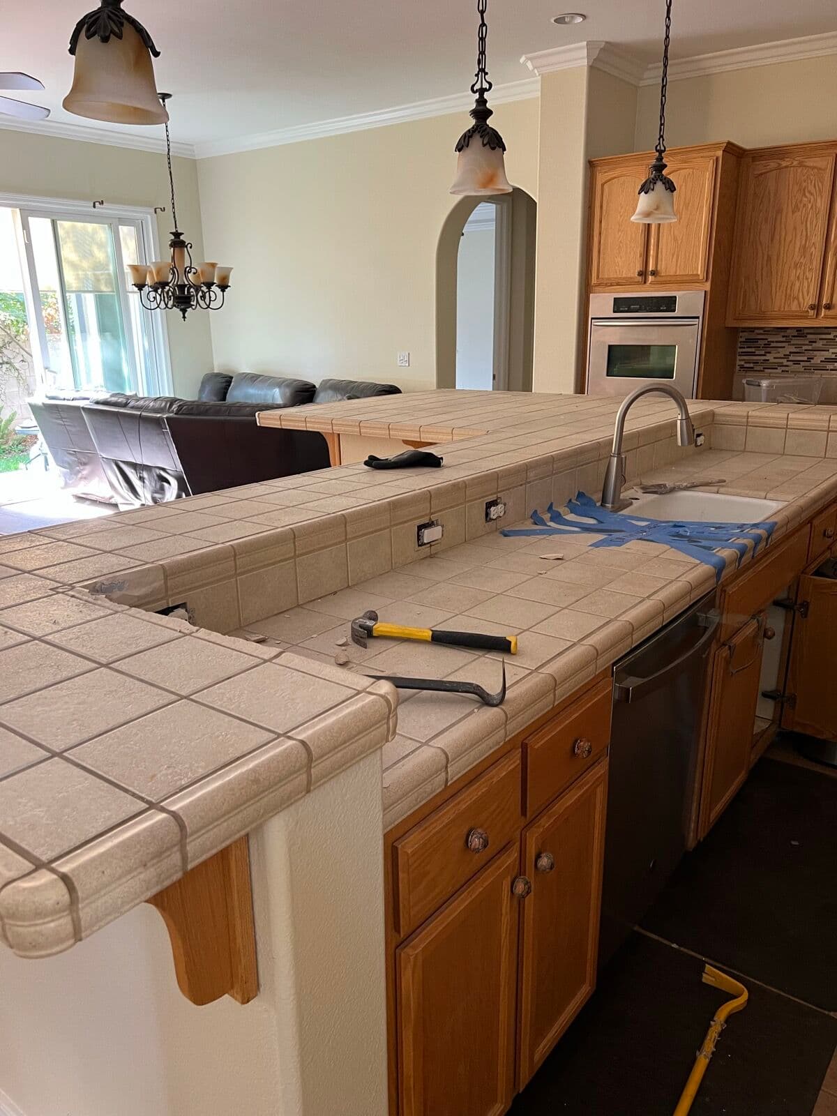 Before — Island and counters: tile to slab granite