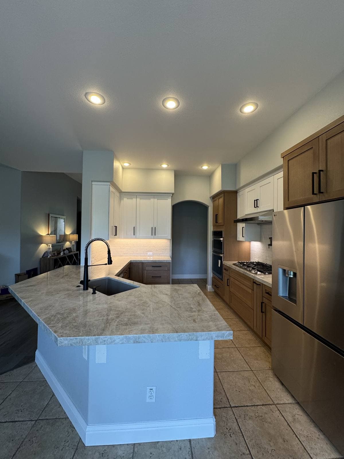 Two-tone kitchen cabinet run installed by OTG